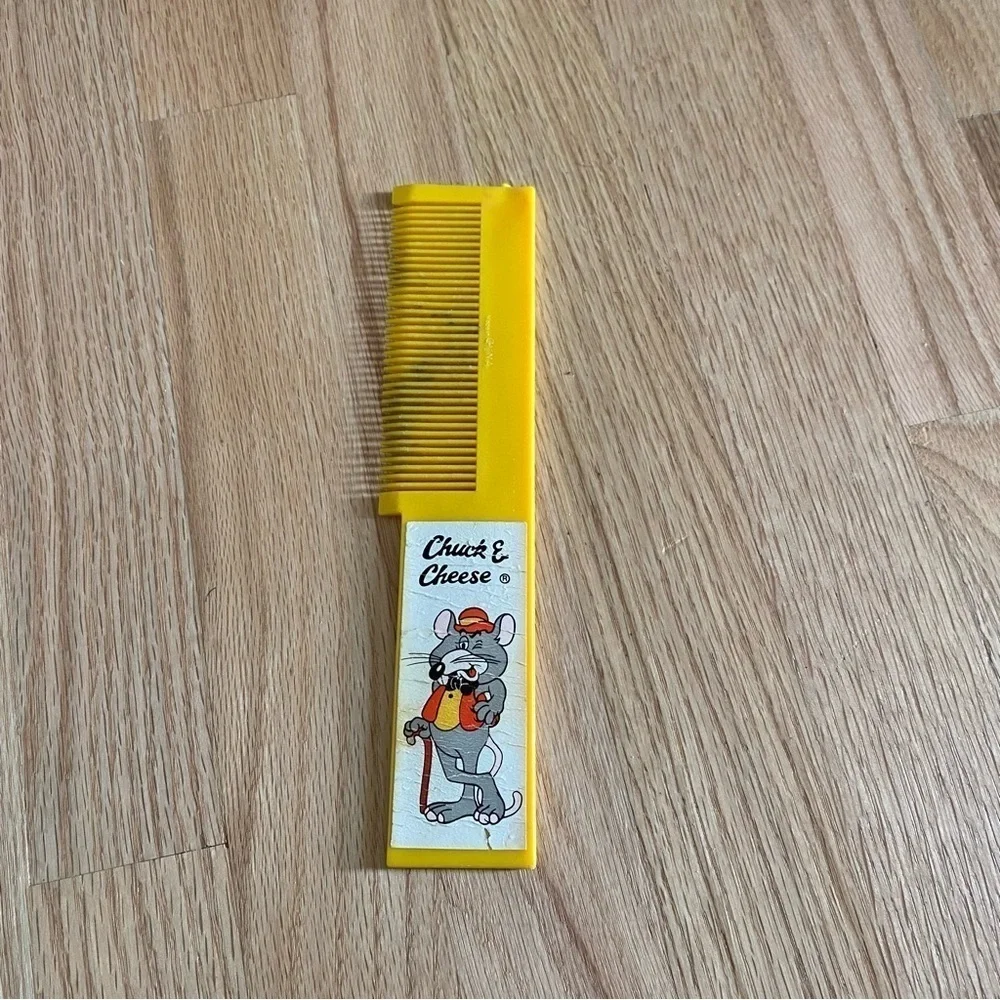 Vintage Yellow Chuck E. Cheese Comb Kids
